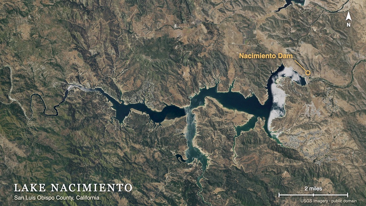 Aerial photograph of Lake Nacimiento, San Luis Obispo County, showing its many branching arms and the dam at the eastern end.